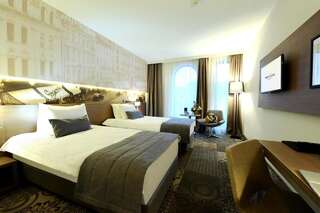 Отель Mercure Bucharest City Center Бухарест Улучшенный двухместный номер с 2 отдельными кроватями-3